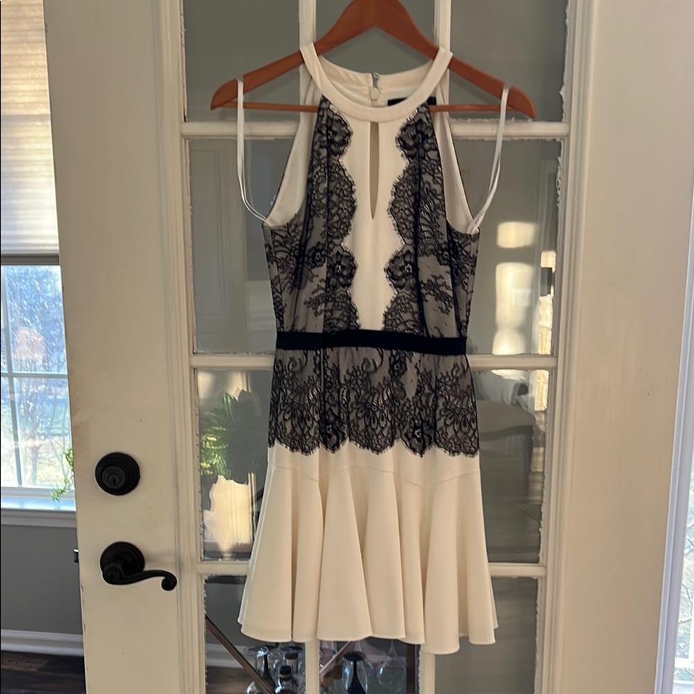 BCBG Max Azria Elegant Lace Dress with Black and White Design